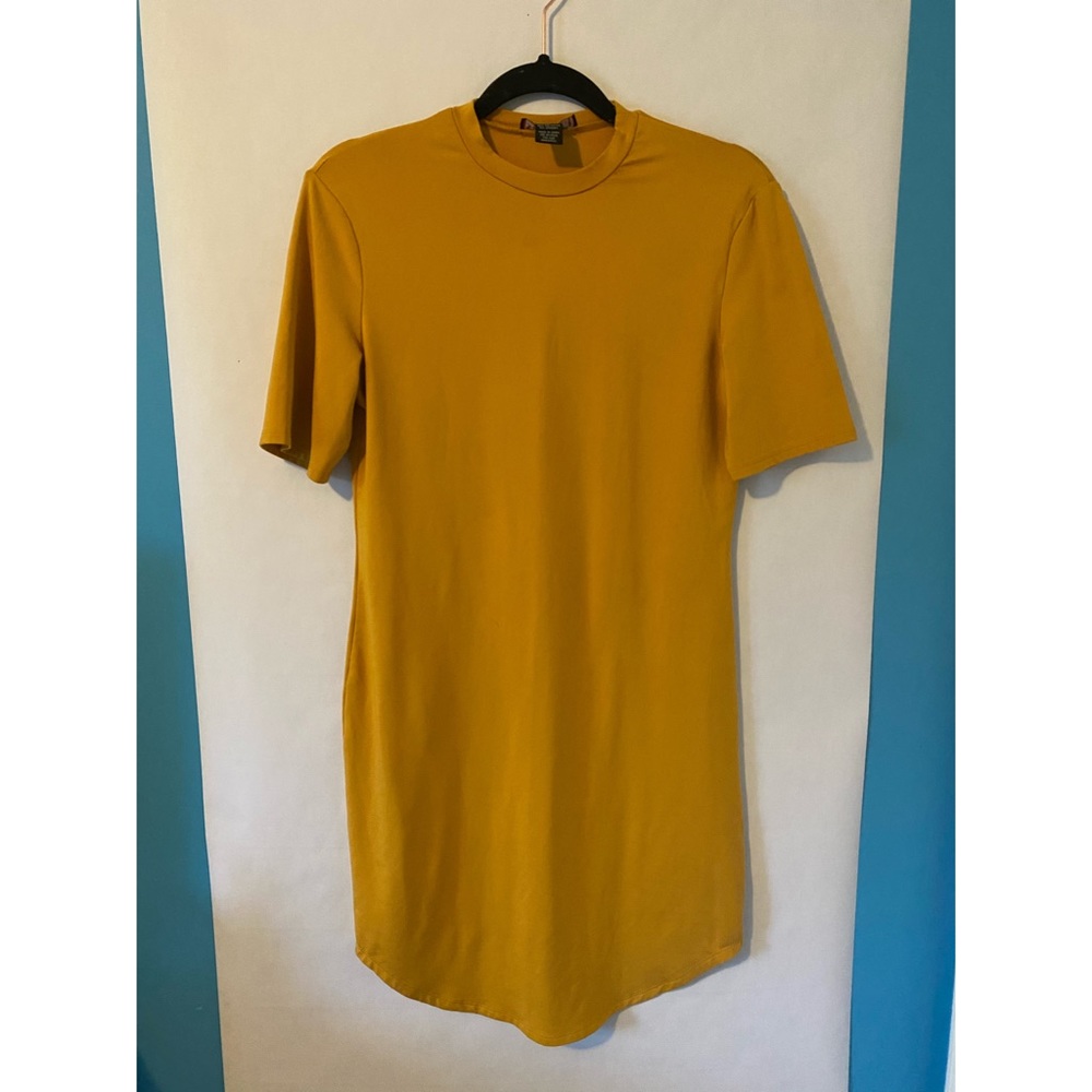 Beautiful mustard yellow fitted dress.